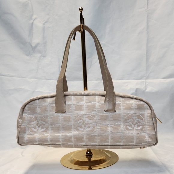 CHANEL Handbags - CHANEL Travel Line Nylon Jacquard Leather bag